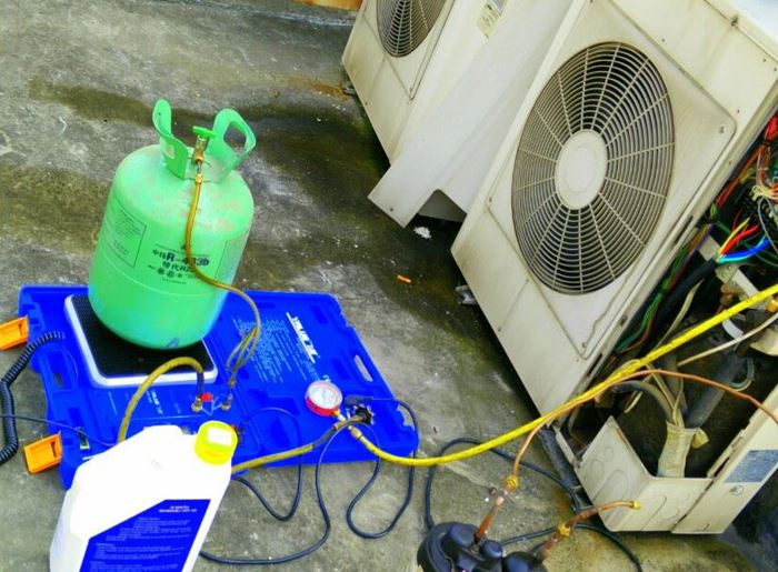 郑州上门快修空调加氟移机清洗维修电话 