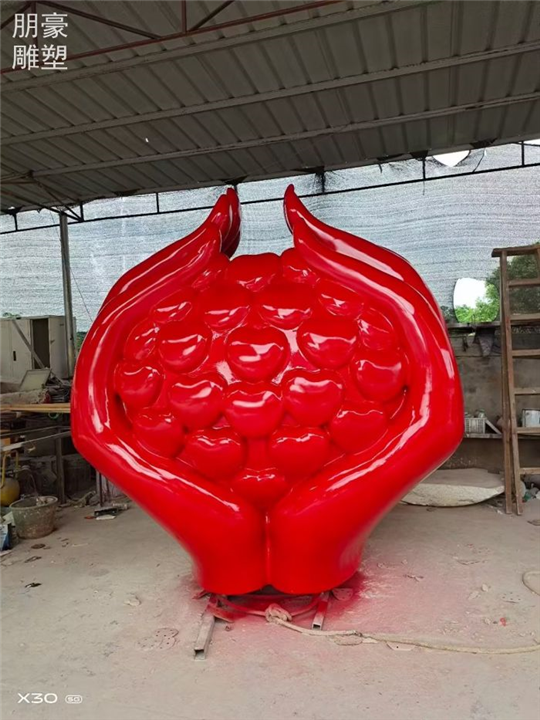 选用景点红石榴雕塑标识制作厂家