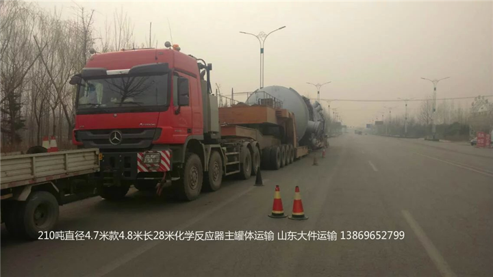 兰州运往东营长28米超大罐体运输 