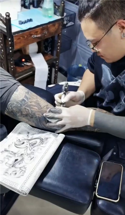 石狮花臂纹身价格 