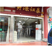 快速卷帘门不锈钢门套无框玻璃地弹门 